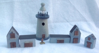 Man of Tin Portable Port lighthouse and buildings